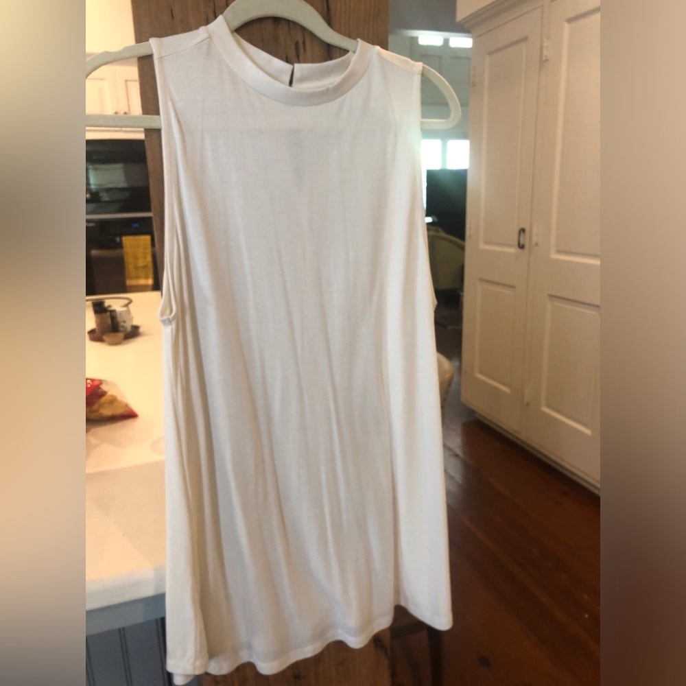 Loft Ann Taylor Large new with out tags. Cream, long top. Maternity?, women teen